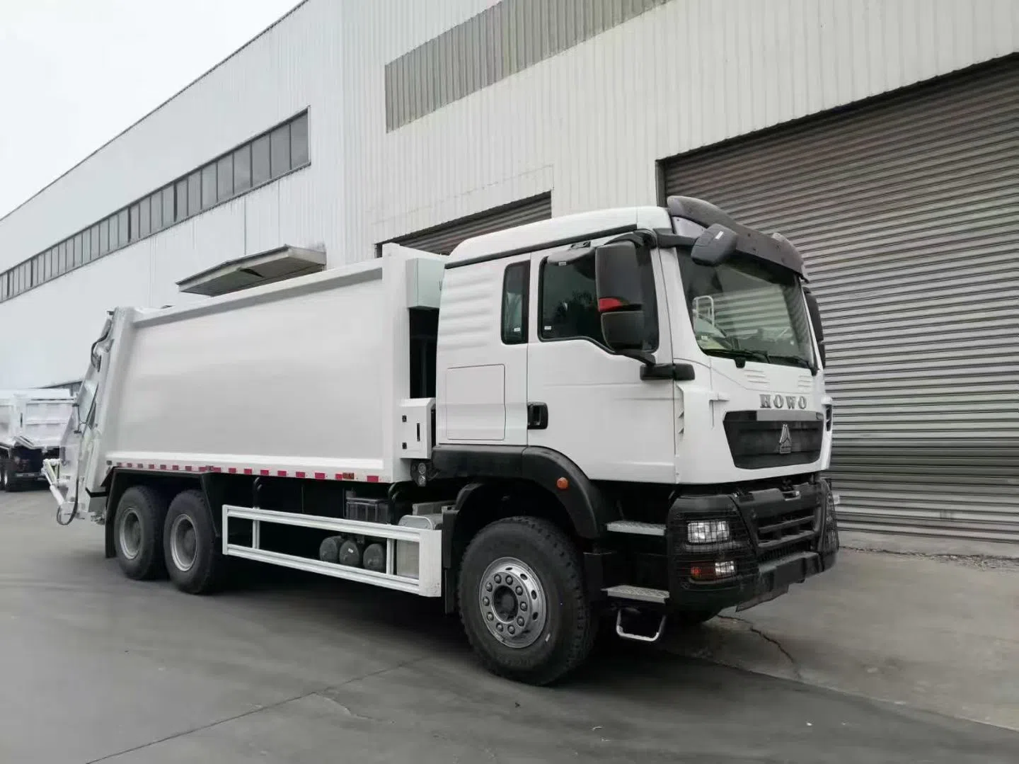 HOWO TX Compressed garbage truck.webp