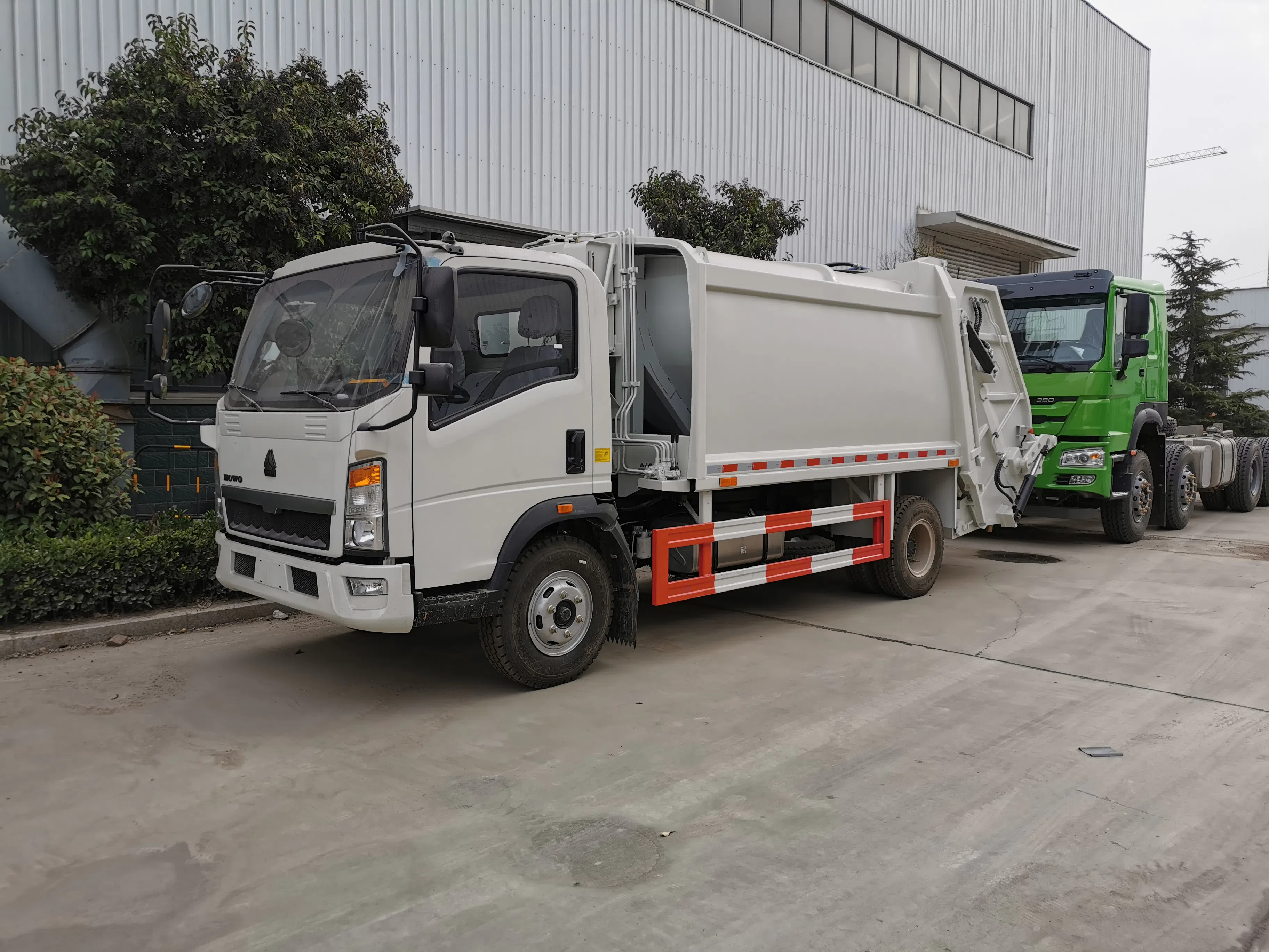 compressed garbage truck.webp
