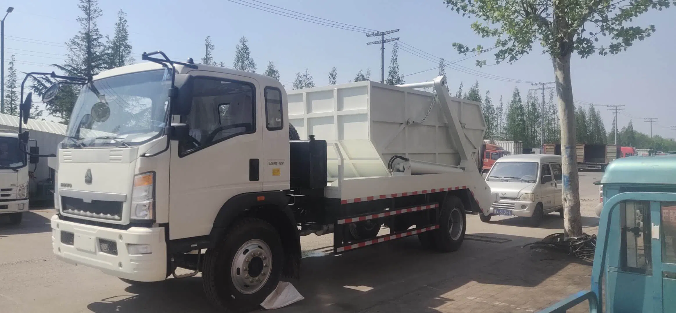 articulated garbage truck.webp