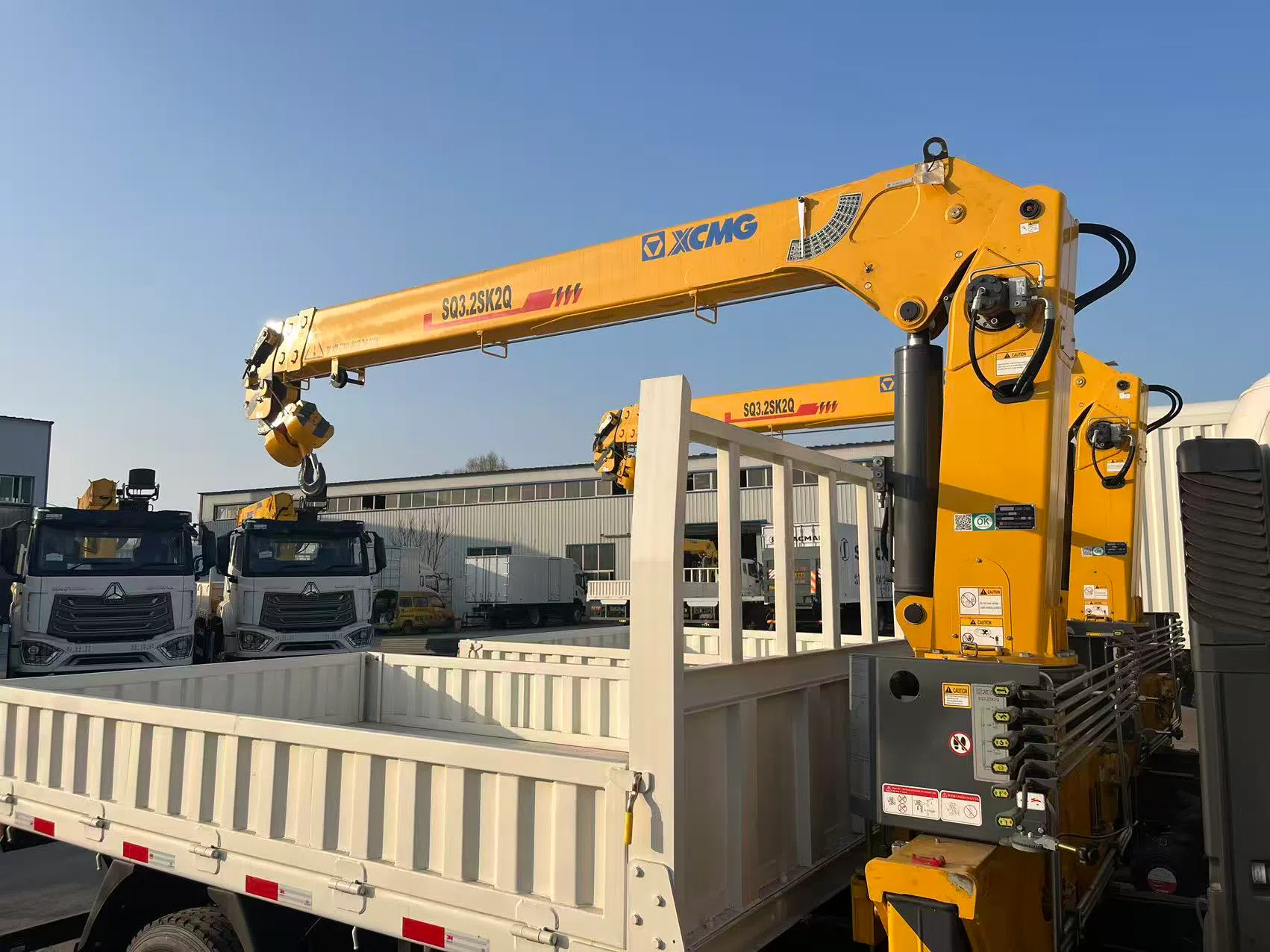 Light-duty truck with crane.webp